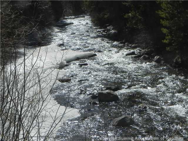 View. Ten Mile Creek runs along south edge of prop