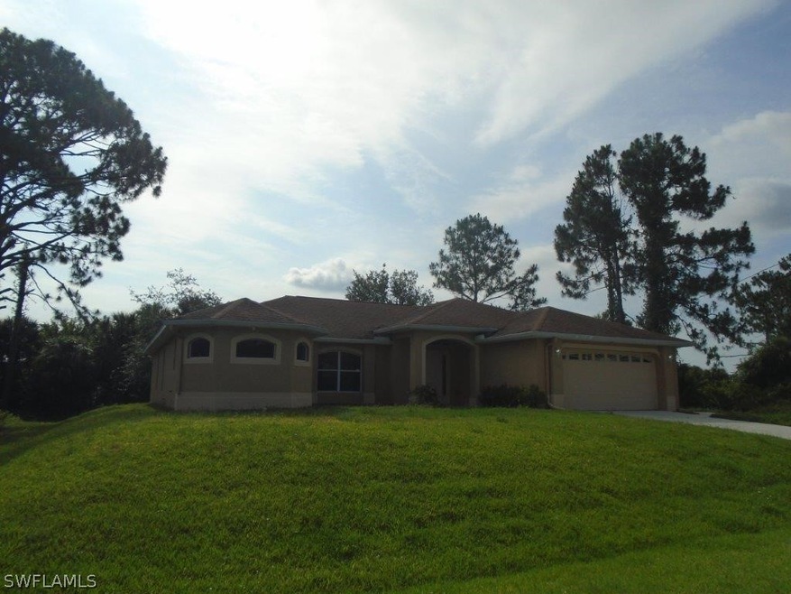 709 Oro Ave S, Lehigh Acres, FL 33974 - photo 1