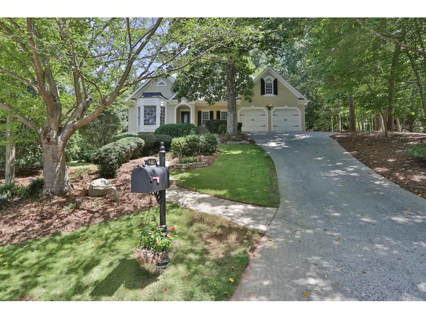 Welcome home! This BEAUTIFUL hard-coat stucco sits