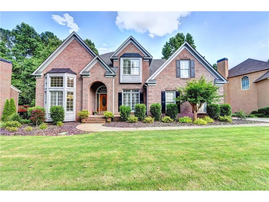 Welcome Home To Olde Atlanta Club.  Stately 3-Side
