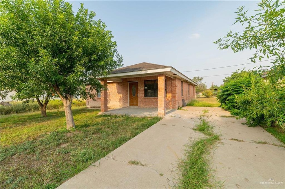 View of shed / structure featuring a yard