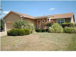 Front of the home that sits on a corner lot
