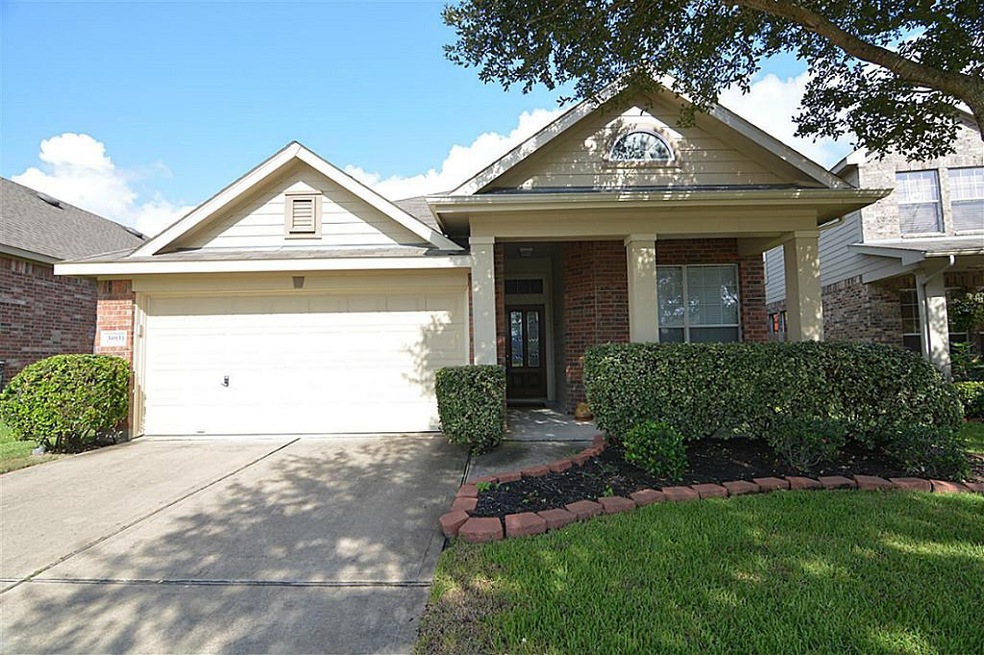 30931 Sundance Woods Ct, Spring, TX 77386 - photo 1