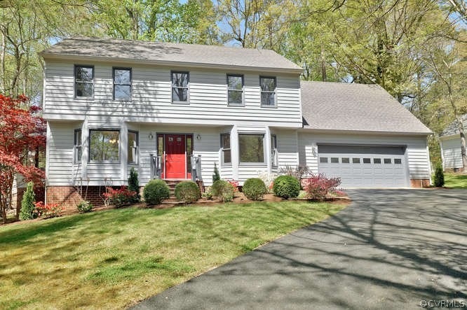 Front View ~ New garage door, all trim & front doo