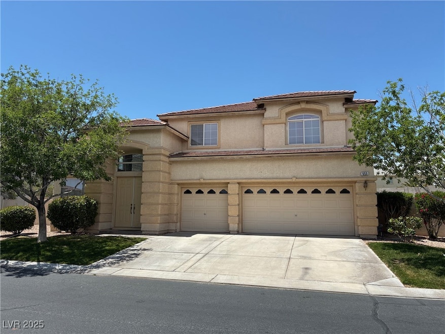 Mediterranean / spanish-style house with driveway,