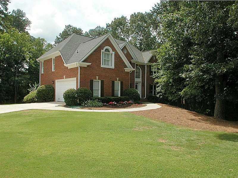Exterior Front. Updated brick home on large level 