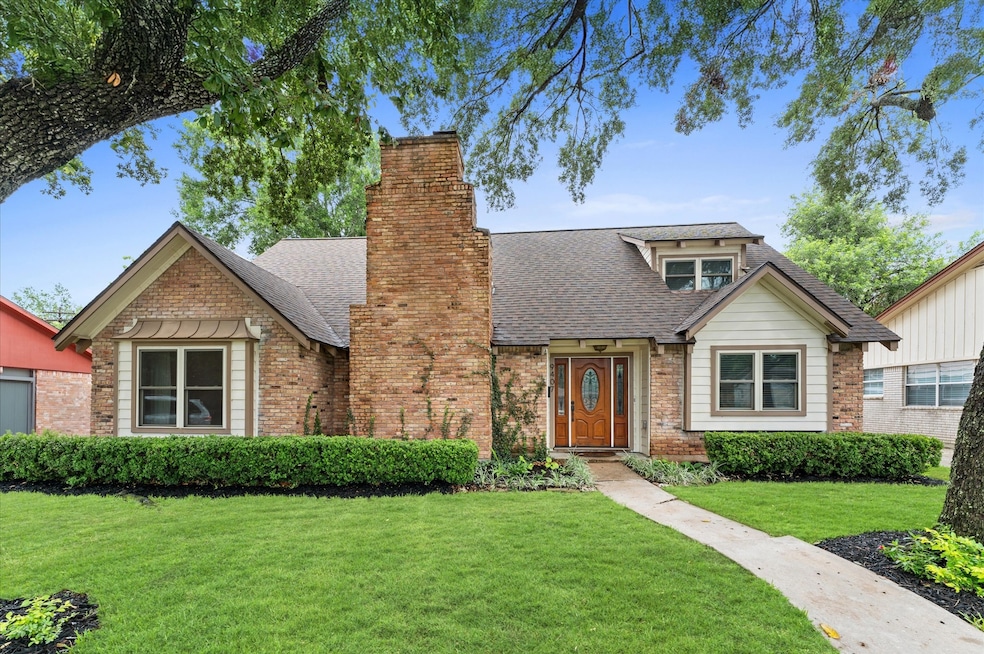 Charming brick home with a welcoming front entry,