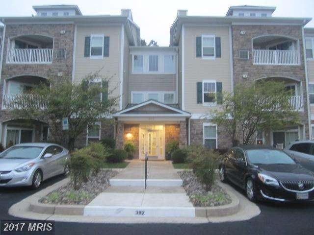 302 Wyndham Cir unit I, Owings Mills, MD 21117 - photo 1