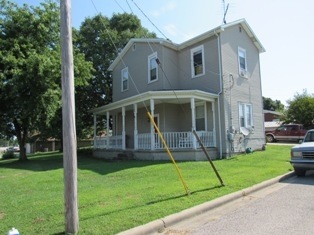 corner, block from school
