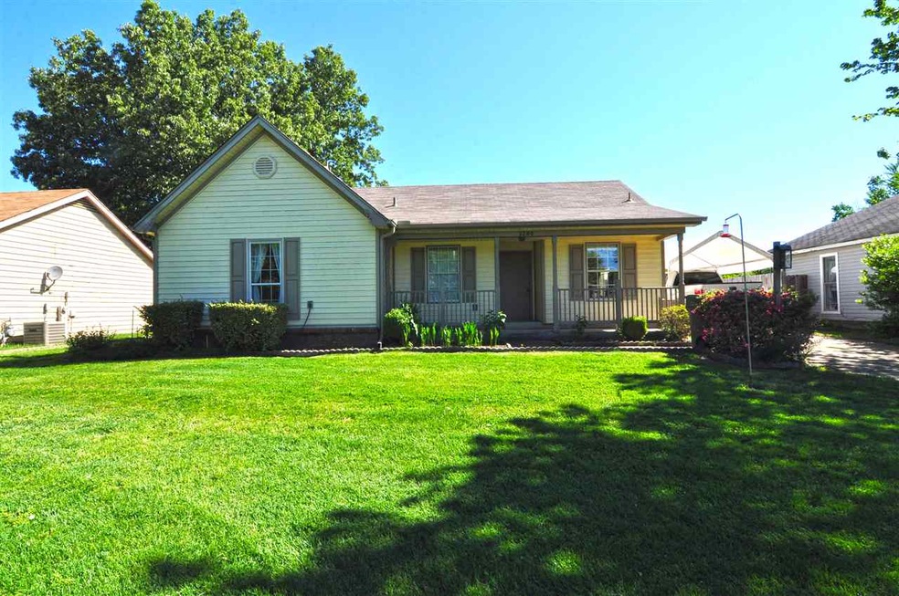 The low maintenance exterior is accented with a la
