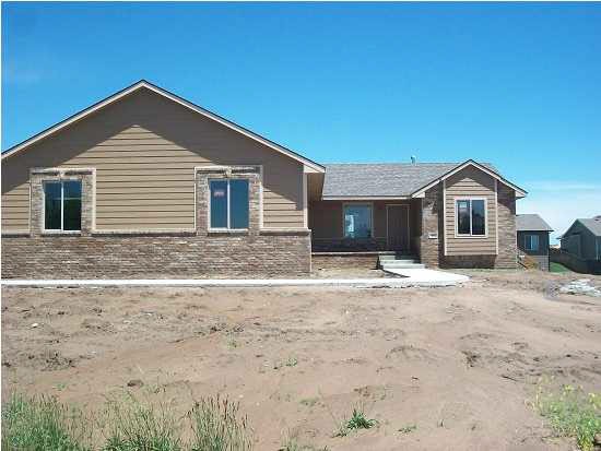 Front view elevation, side load on corner lot.