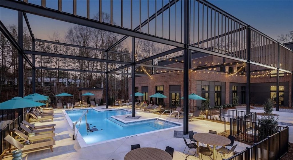 Community pool with a patio area