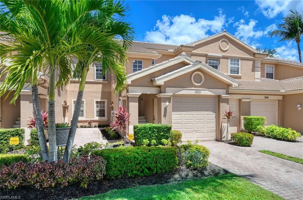 Townhome / multi-family property with stucco sidin