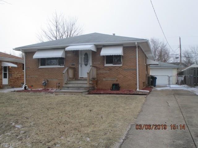 313 Thelma Dr, Sheffield Lake, OH 44054 - photo 1