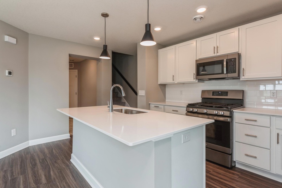 Welcome to Weston Commons! This stunning Franklin end unit is available for a quick move-in! *Photos are of another home, colors and finishes may vary.
