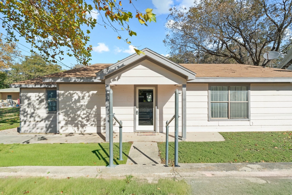 View of front of home featuring a front lawn