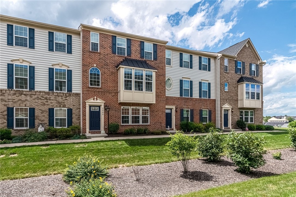 Stunning, all brick 5 years young townhome full of