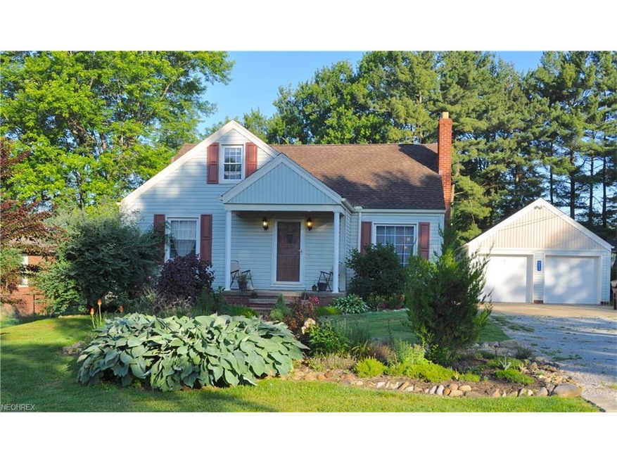 Wonderfully updated bungalow with two car garage. 
