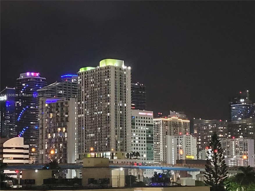 Spectacular balcony night view of Downtown Miami a