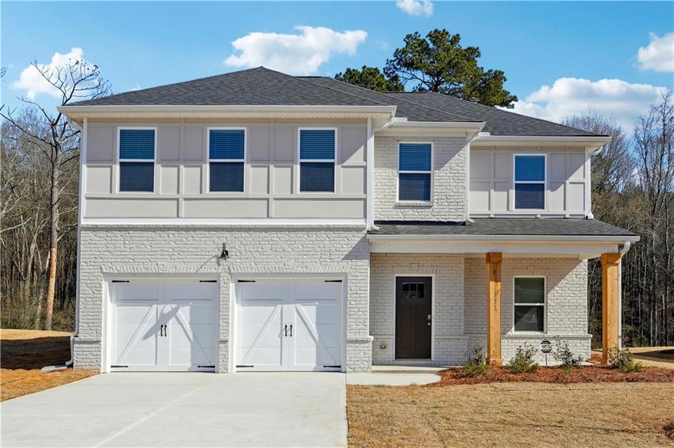 View of front of property with a shingled roof, br