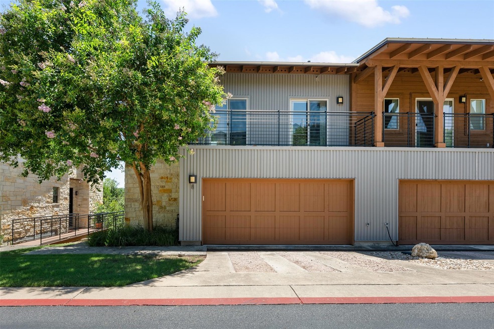 View of front of property featuring a garage and 
