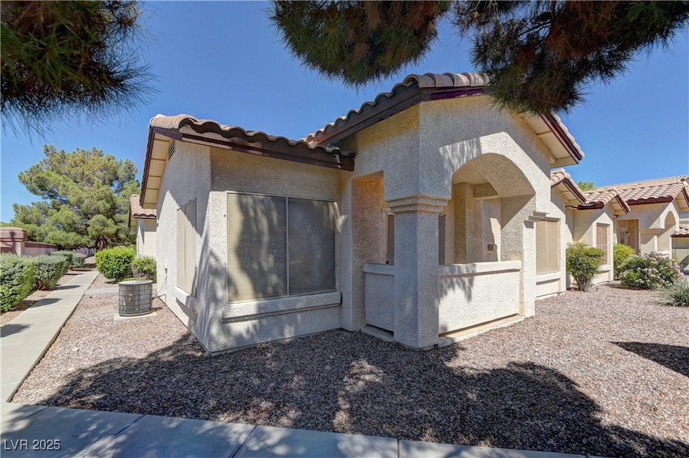 Mediterranean / spanish-style home featuring a tile roof and stucco siding
