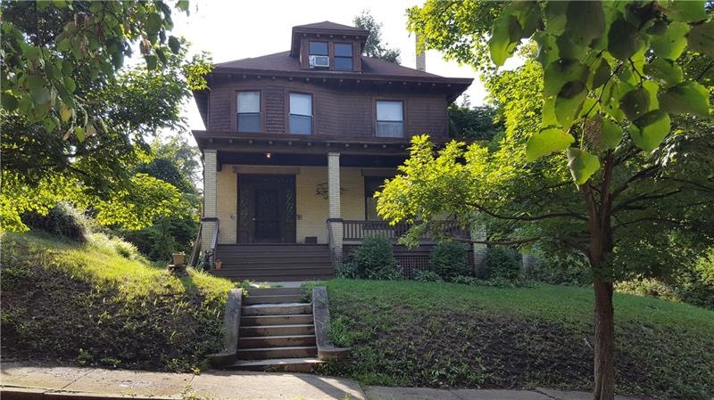 Two lots in one with a wooded park view from the f