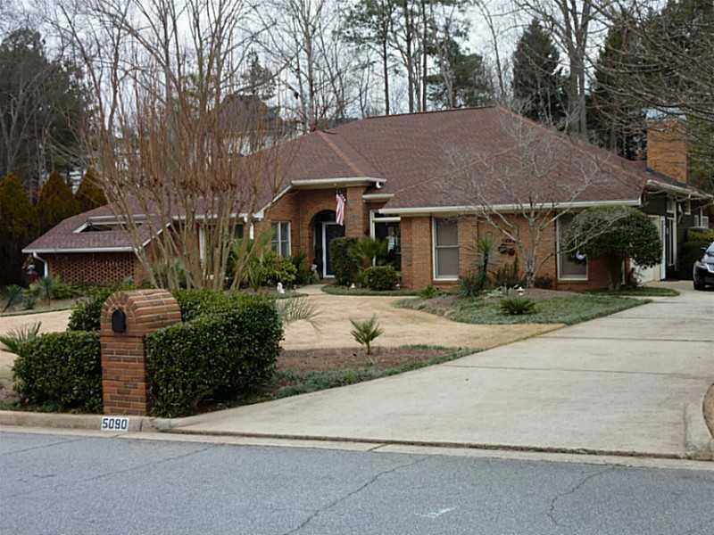 Exterior Front. Brick front, dimensional roof in 2