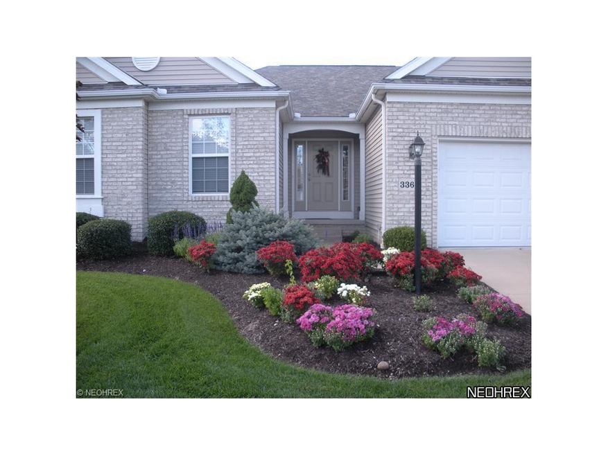 Nice landscaping at the front entrance. The lawn h