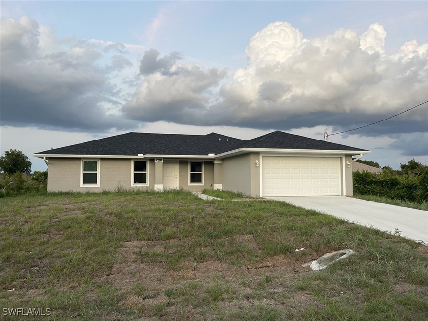 Ranch-style home with a garage