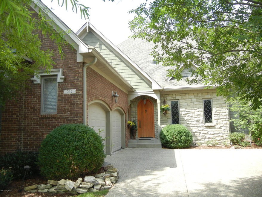 Front of home with courtyard entry