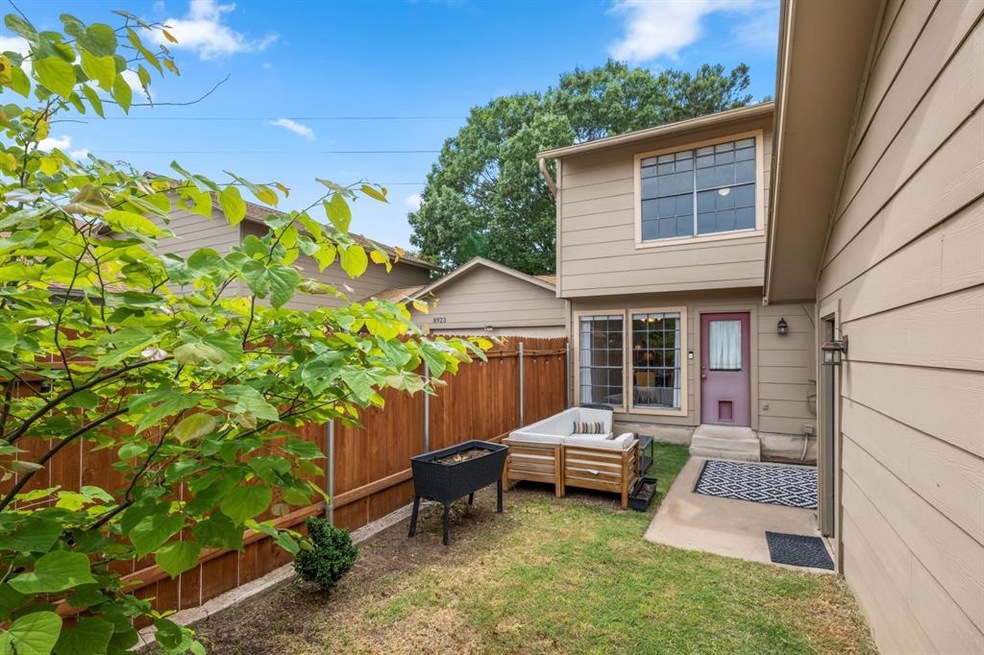 Private backyard with detached garage in picture t