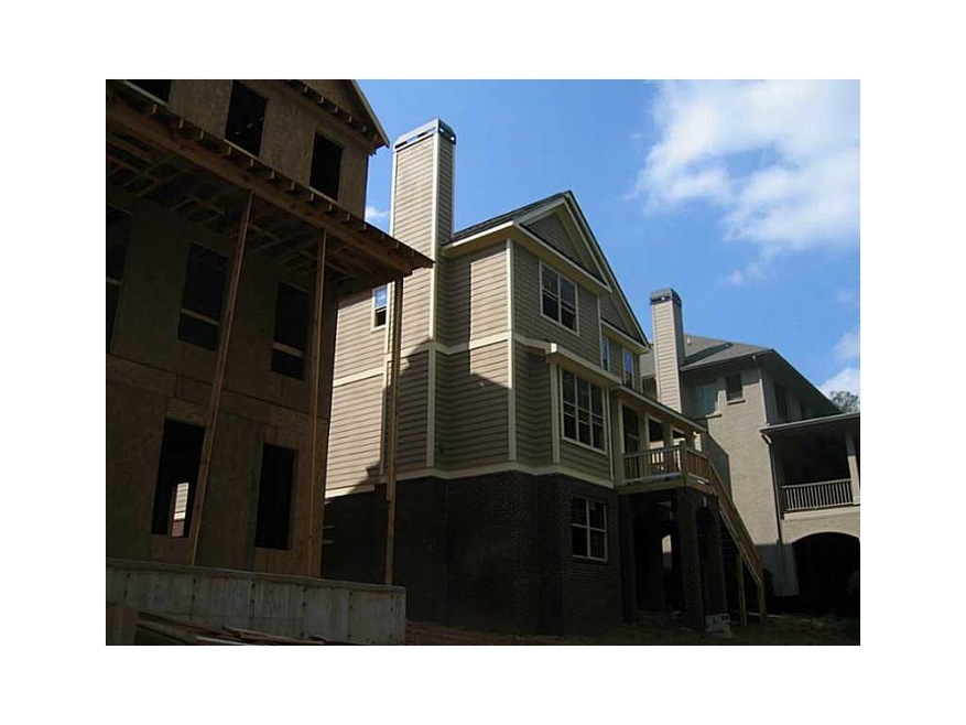 Exterior Front. two new homes, coming up to comple