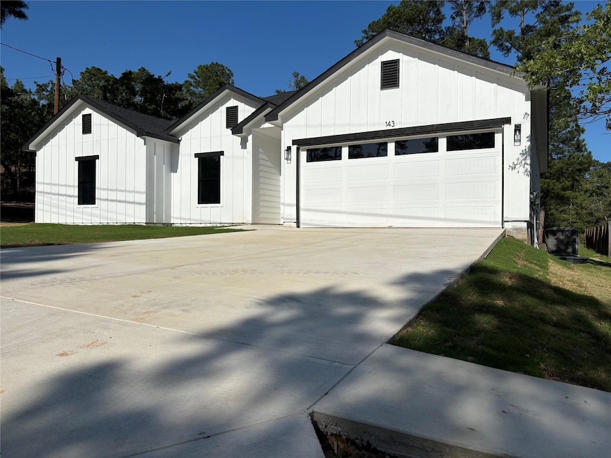 Modern inspired farmhouse with board and batten s