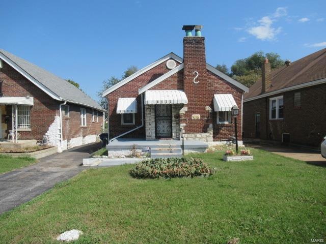 4623 Kossuth Ave, Saint Louis, MO 63115 - photo 1