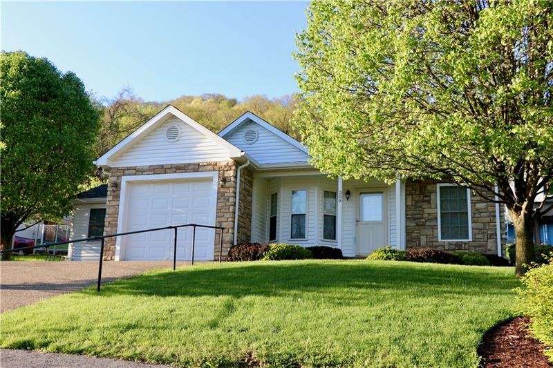 GET READY TO FALL IN LOVE!  LUSHLY LANDSCAPED, AND
