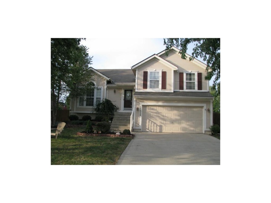 Front of home with upgraded landscaping