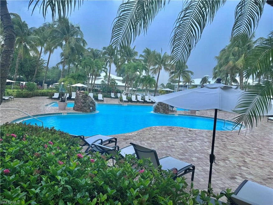 Community pool with a patio area