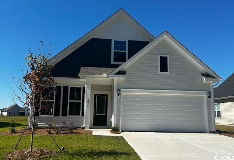 View of front facade featuring a front lawn and a 