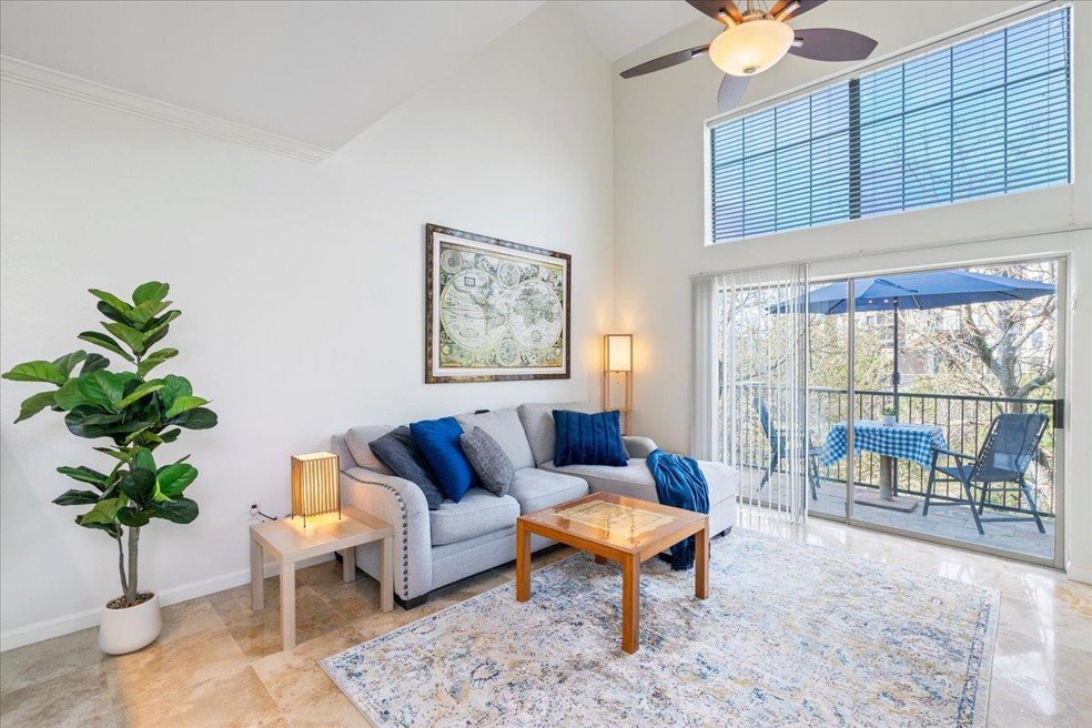 Living area with high vaulted ceiling, ornamental