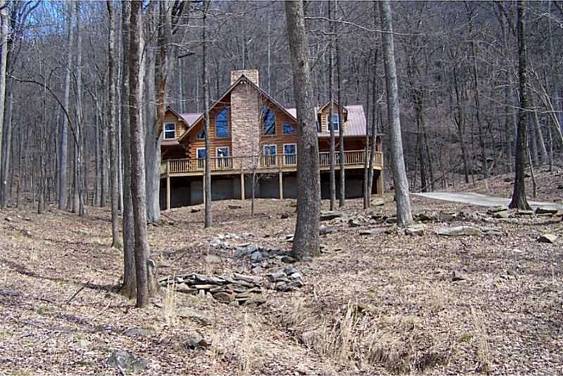 Exterior Front. Long paved driveway