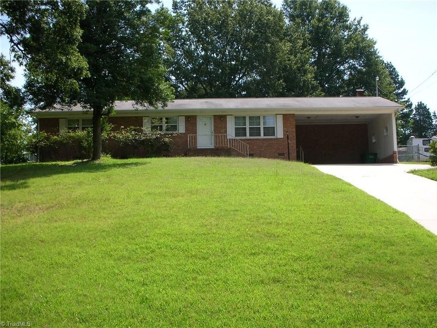 Visualization is a key part of your home buying process. As you are looking at these pictures, take a minute to see yourself there in each photo moving from room to room with family. See & Feel how it will be to live in this home.  Here you are out front looking at the front view of the home. You notice the green grass, the paved concrete driveway, the mature trees in the front and backyard, the front landscaping and the 2 car attached carport and turn-around.