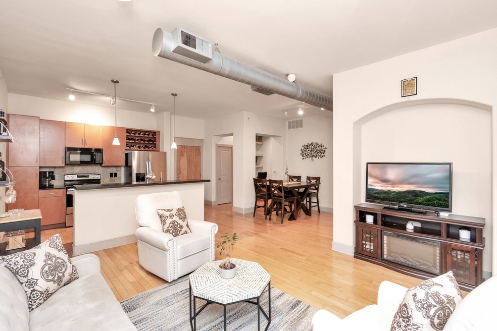 Family room with wood flooring.