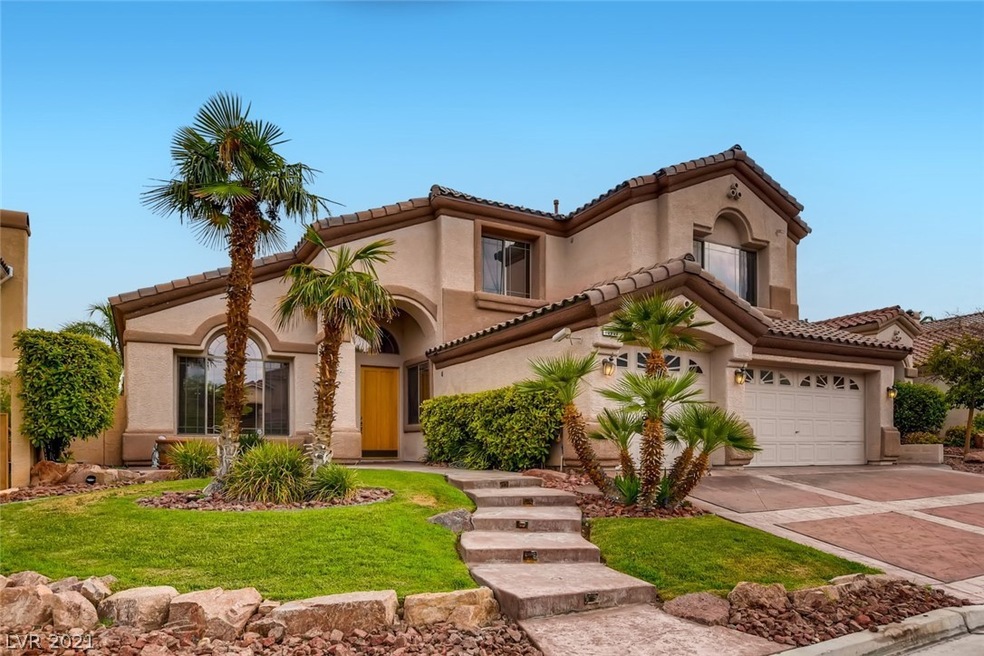 Home sits on elevated lot with inviting curb appea