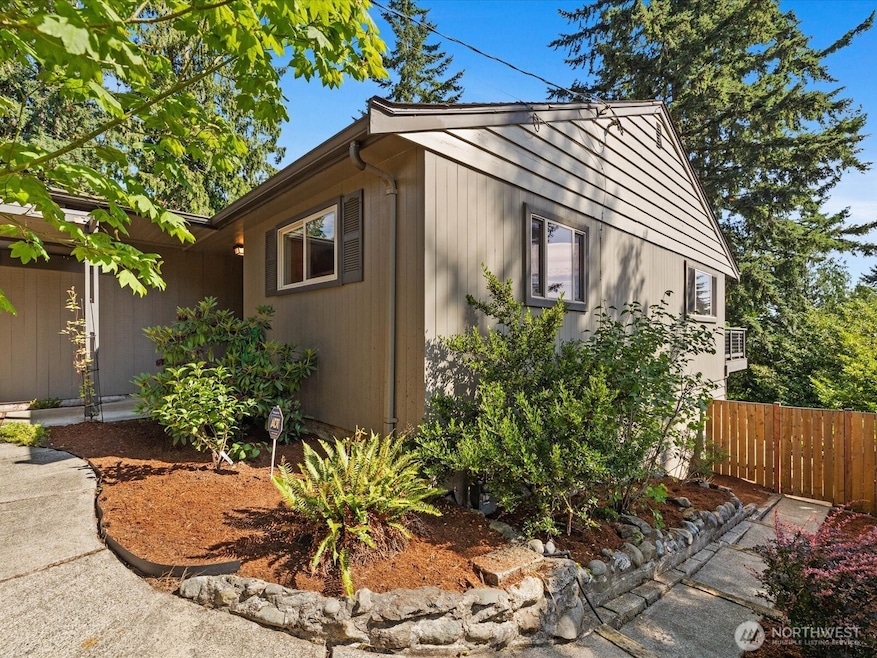 Gates on both sides of fully fenced back yard.