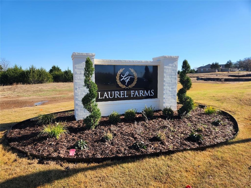 Community sign with a lawn