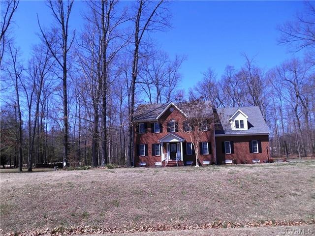 Gorgeous 2 Story Brick Front Colonial in an Establ