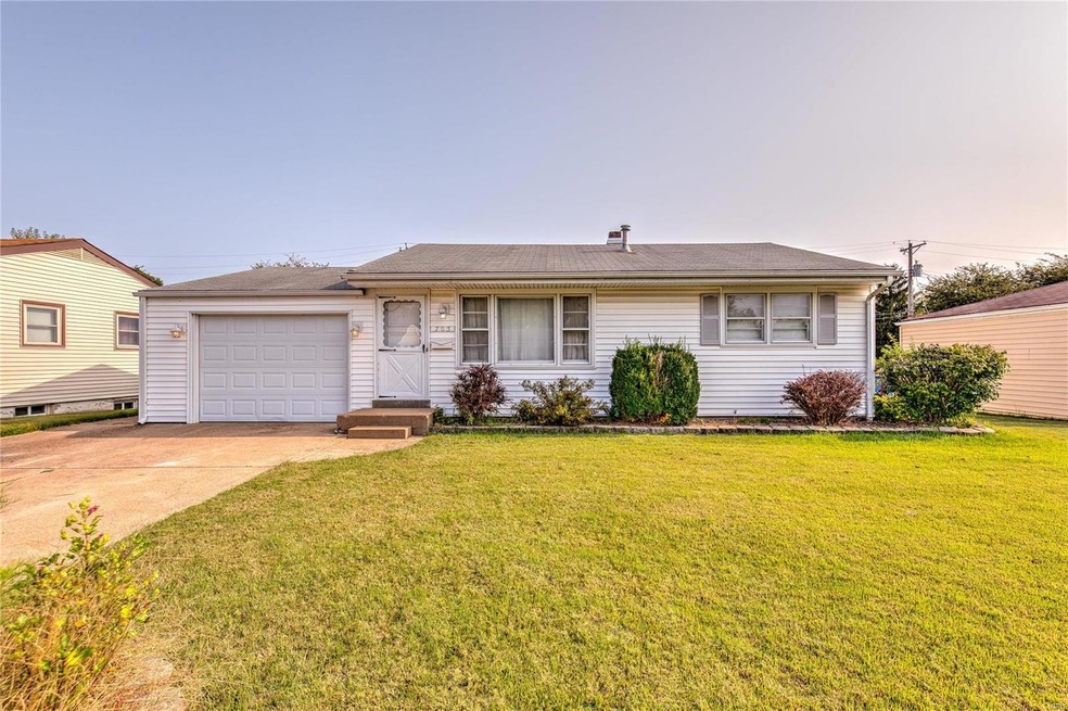 705 Florland offers a double driveway and oversize