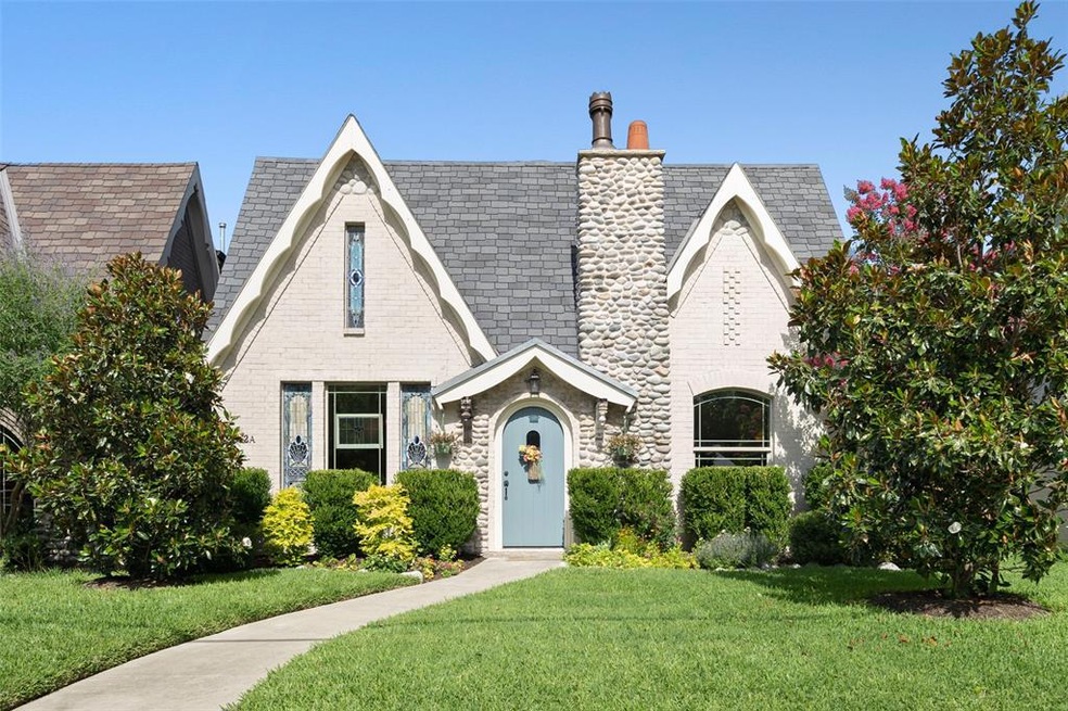 Charming Brick Tudor and a natural stone chimney w
