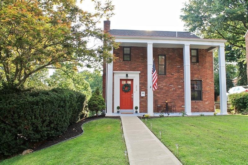 Charming, level-entry all-brick Colonial in a grea